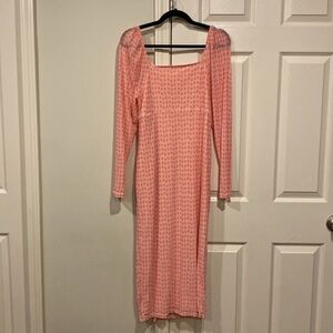 Pink polka dot midi length dress